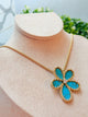 Collar flor turquesa